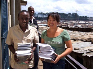 Steve (dignitas country director) & tiffany (dignitas executive director) handing out new textbooks yesterday